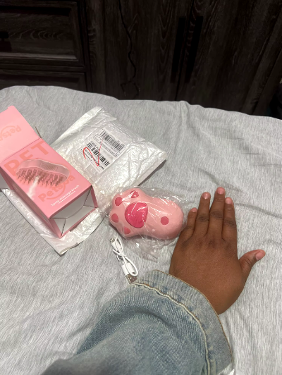 A pink steam pet comb for grooming pets - Customer review photo