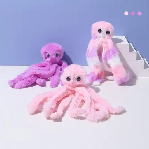 Cute octopus plush toy for cats, soft and durable with dangling tentacles, designed for biting, pouncing, and cuddling.