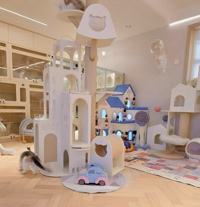 A luxury cat castle with one cat at the top of the castle and a cat at bottom of the castle - Customer review photo