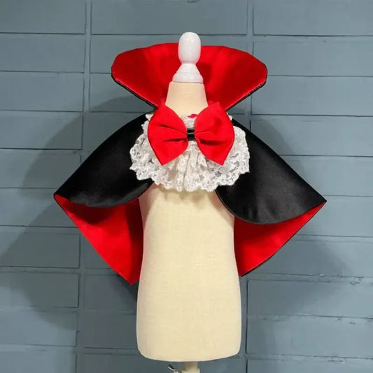 Red and black Halloween vampire cape costume for small to medium dogs, ideal for spooky parties and festive events.