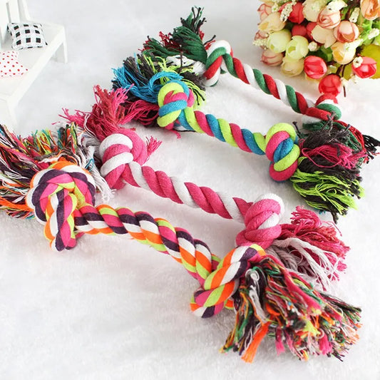 Durable cotton rope dog toy with knot design for small dogs and puppies, promotes dental health and safe chewing.
