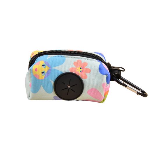 Colorful dog poop bag dispenser with leash clip and stylish print design