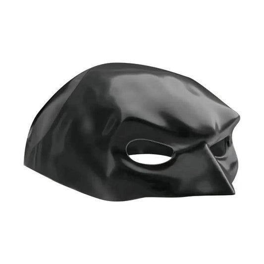 Cat wearing a black bat-inspired superhero mask, posing confidently for Halloween.