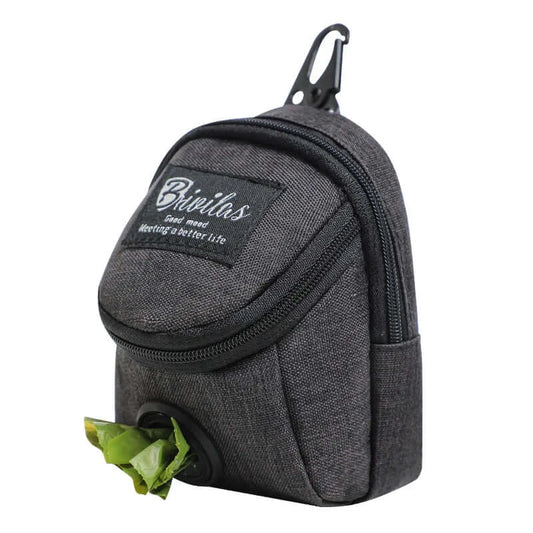 Multifunctional dog training pouch with treat storage and built-in poop bag dispenser, ideal for walking and outdoor training.