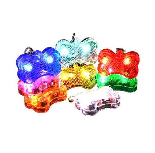 Adjustable glowing bone pendant for dog nighttime visibility