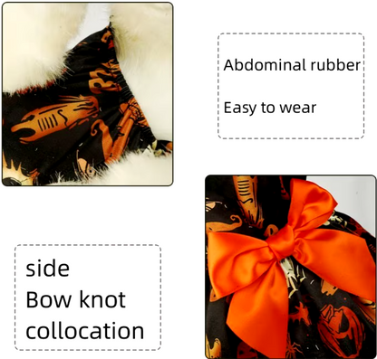 Small dog wearing a Halloween-themed dress with bow and puffy skirt.
