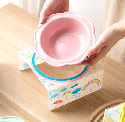 Flower-shaped ceramic pet bowl with clear acrylic stand for cats and dogs.