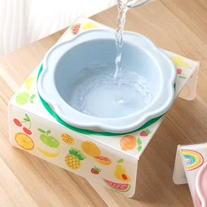 Flower-shaped ceramic pet bowl with clear acrylic stand for cats and dogs.