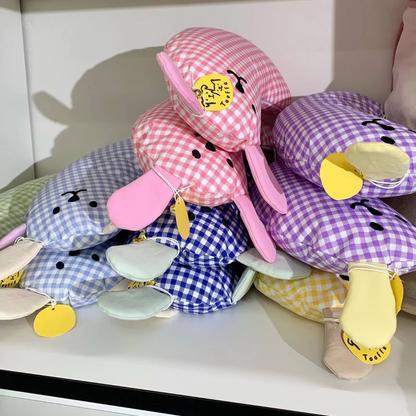 U-shaped cotton pet pillow for cats and dogs with removable washable cover, ideal for chin support and deep sleep.