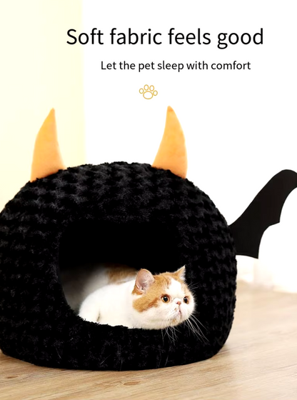 Halloween-themed imp cat house with cozy plush design for cats and small dogs.