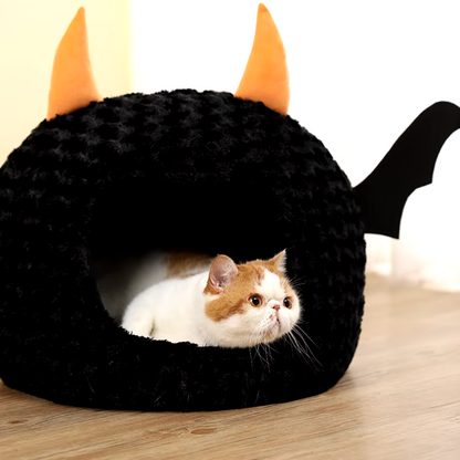 Halloween-themed imp cat house with cozy plush design for cats and small dogs.