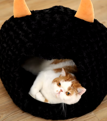 Halloween-themed imp cat house with cozy plush design for cats and small dogs.
