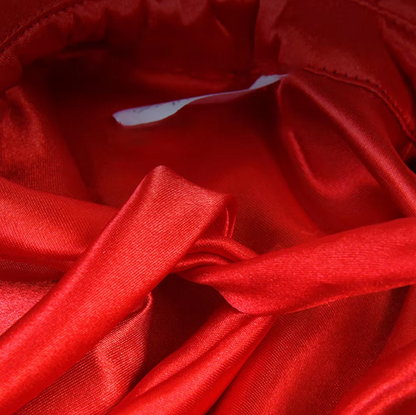 Black vampire cloak Halloween costume for cats with adjustable neckline and lightweight polyester fabric.