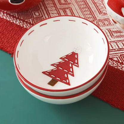 Christmas-themed ceramic pet bowl with Santa Claus, elk, and tree designs, perfect for food or water