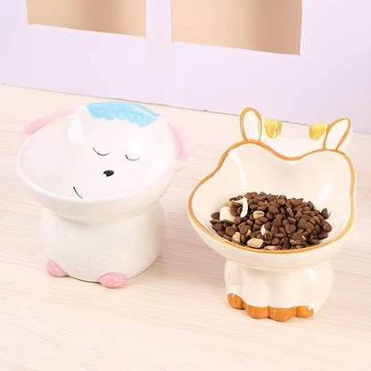 Cute ceramic cartoon pet bowl elevated for cats and small dogs.