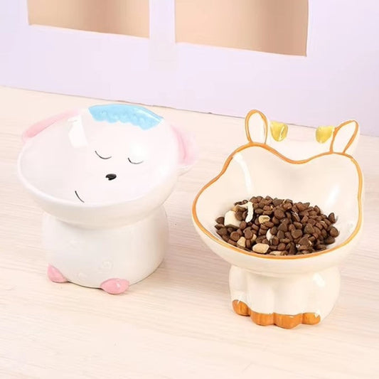 Cute ceramic cartoon pet bowl elevated for cats and small dogs.