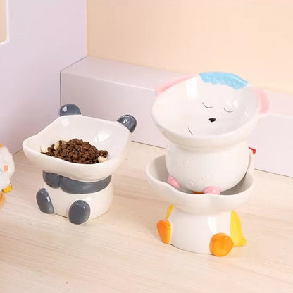 Cute ceramic cartoon pet bowl elevated for cats and small dogs.