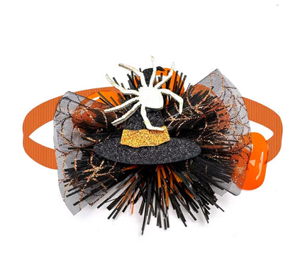 Dog wearing a cute pumpkin and skull Halloween bow tie for festive fun.