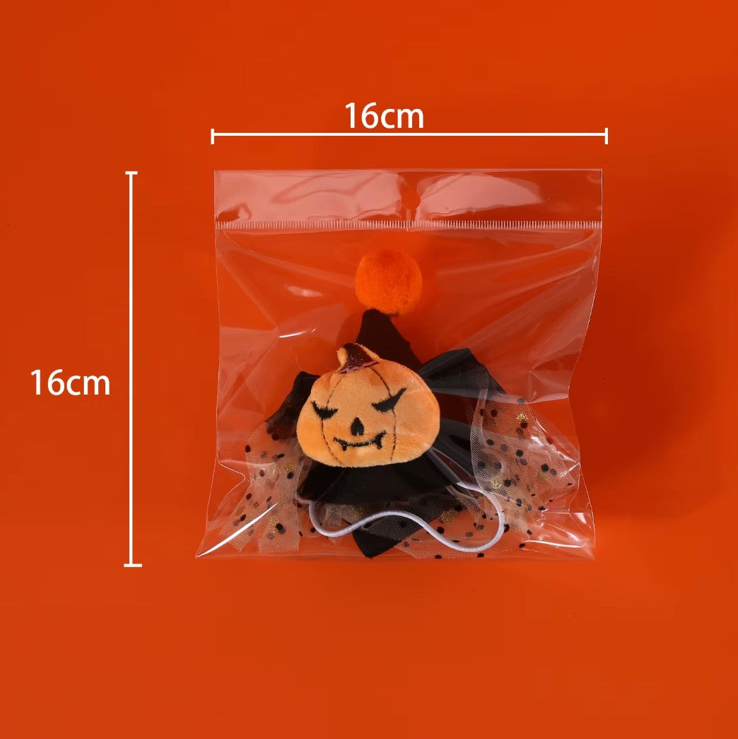 Pet Halloween costume set with bat, spider, and pumpkin hats, headband, lace bib, and scarf for cats and dogs.