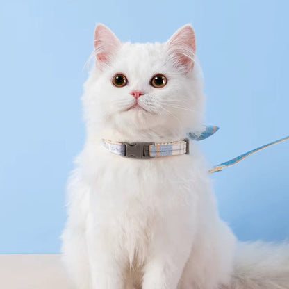 Adorable cat and dog harness vest with adjustable breast strap and matching leash for small pets.