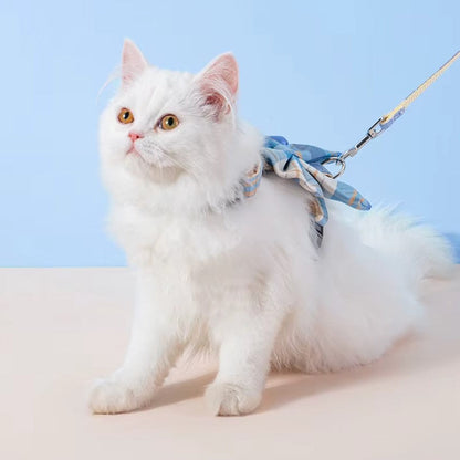 Adorable cat and dog harness vest with adjustable breast strap and matching leash for small pets.