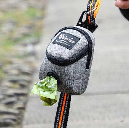 Multifunctional dog training pouch with treat storage and built-in poop bag dispenser, ideal for walking and outdoor training.