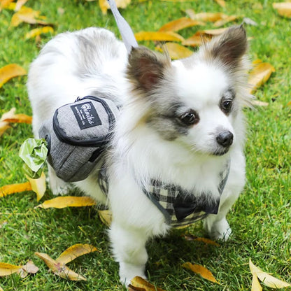 Multifunctional dog training pouch with treat storage and built-in poop bag dispenser, ideal for walking and outdoor training.