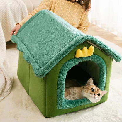 Small dog resting inside a foldable fleece dog kennel bed