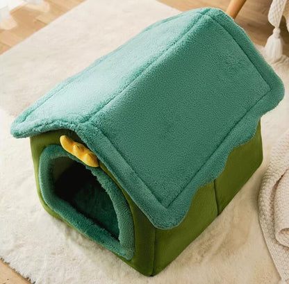 Small dog resting inside a foldable fleece dog kennel bed