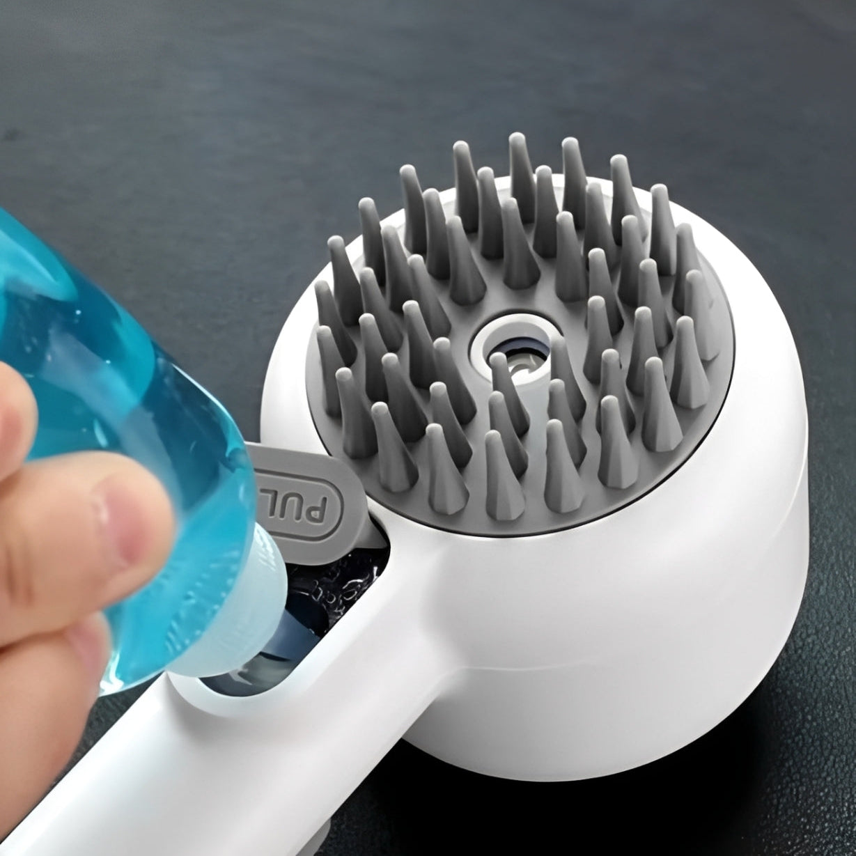 Close-up of The Artisan™ dual-sided pet grooming brush with cool mist feature, ideal for pet grooming for cats and dogs.