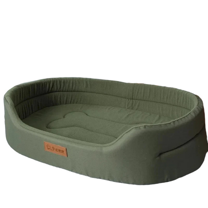 Fluffy sofa-style dog bed for small and large dogs, featuring ultra-soft materials, raised edges, and non-slip bottom for cozy all-season comfort.