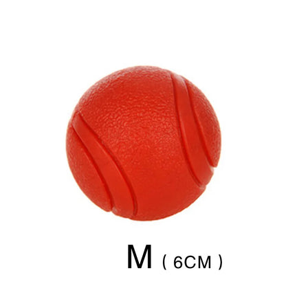 Durable red rubber dog ball made from TPR, designed for strong chewers and active dogs, available in multiple sizes.