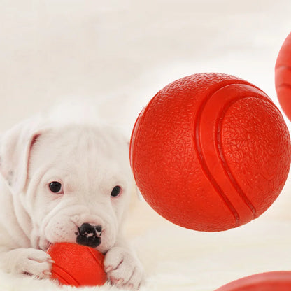Durable red rubber dog ball made from TPR, designed for strong chewers and active dogs, available in multiple sizes.