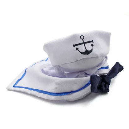 Cat wearing a funny navy sailor costume with a sailor hat and collar, looking stylish and adorable.