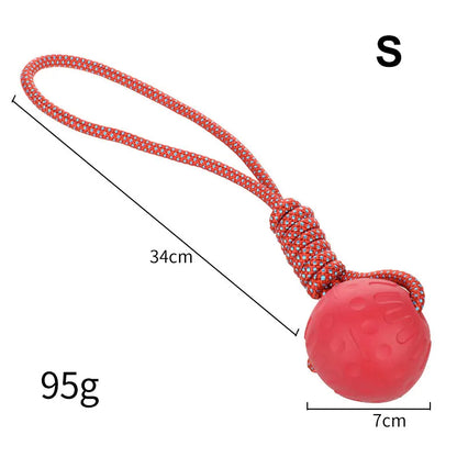 Durable red rubber dog ball made from TPR, designed for strong chewers and active dogs, available in multiple sizes.