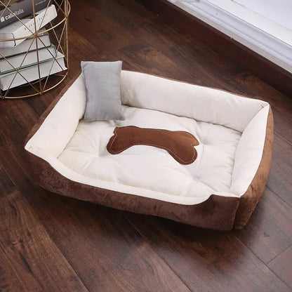 Bone-shaped soft cotton dog bed, washable and breathable with warm padding, designed for year-round comfort and suitable for dogs of all sizes.