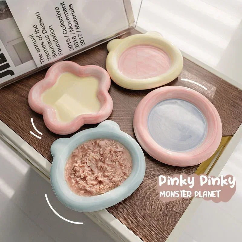 Cute cartoon ceramic pet bowl for cats and small dogs, perfect for food and water, with a charming design and easy-to-clean surface.