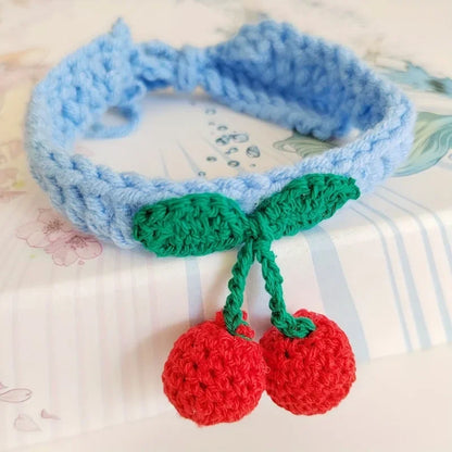 Handmade knitted pet collar with cherry decoration for cats