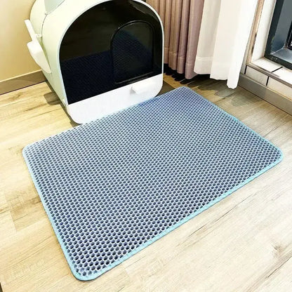 Double-layer waterproof cat litter mat made of soft EVA material for easy litter collection and floor protection.