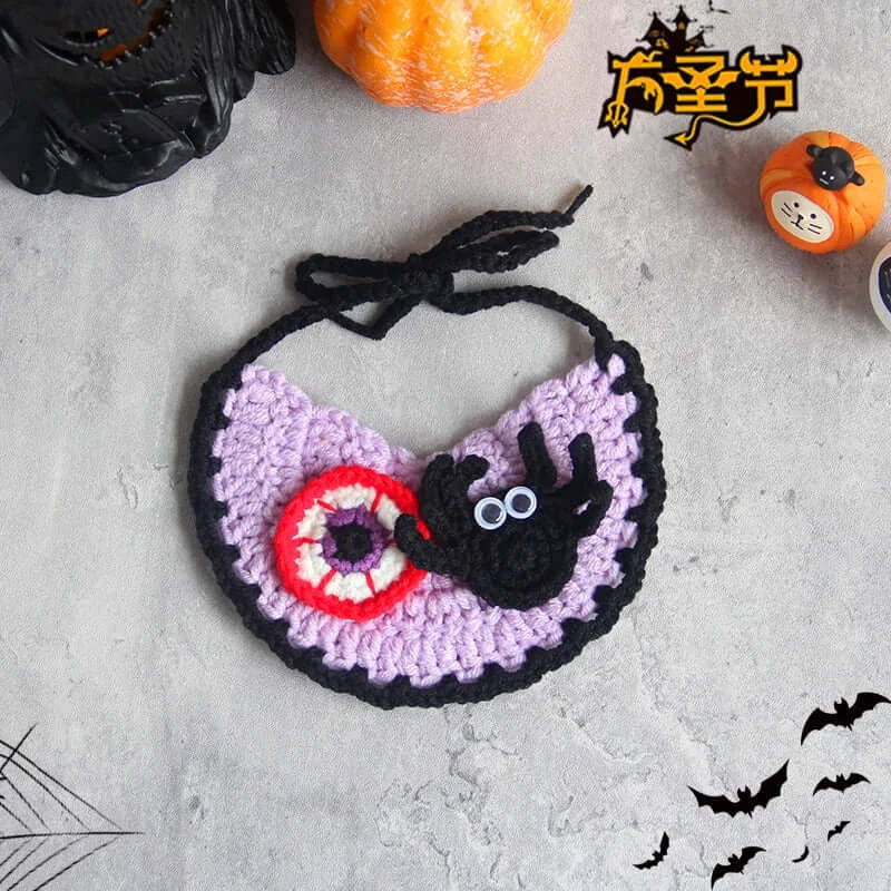 Hand-knit Halloween pet collar bib featuring ghost designs, perfect for dressing up cats and dogs during the spooky season.