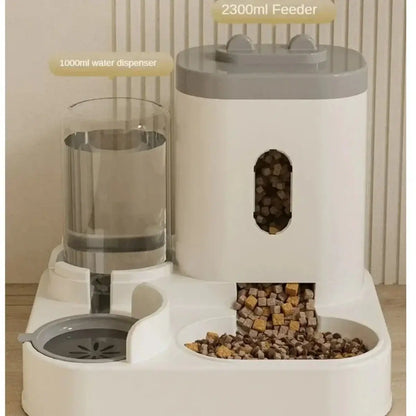 Non-electric automatic pet feeder and water dispenser with raised dual bowl design for cats and dogs.