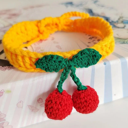 Handmade knitted pet collar with cherry decoration for cats