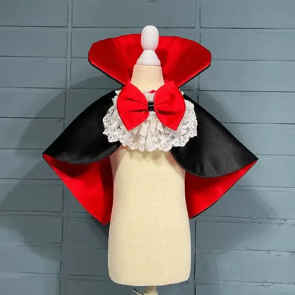 Red and black Halloween vampire cape costume for small to medium dogs, ideal for spooky parties and festive events.