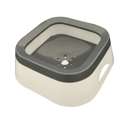 Anti-splash pet water bowl with 1L capacity and floating disk design, spill-proof solution for dogs and cats at home or on the go.