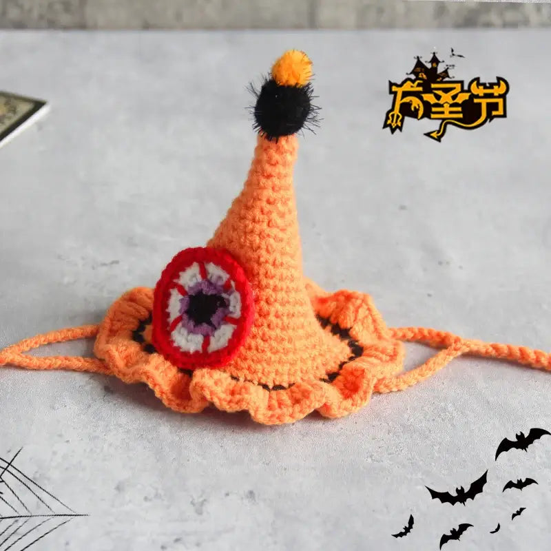 Hand-knit Halloween pet collar bib featuring ghost designs, perfect for dressing up cats and dogs during the spooky season.