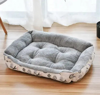 Bone-shaped soft cotton dog bed, washable and breathable with warm padding, designed for year-round comfort and suitable for dogs of all sizes.