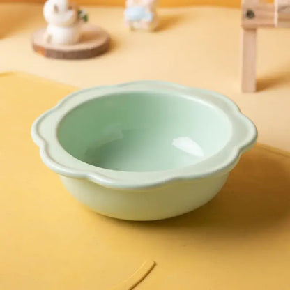 Flower-shaped ceramic pet bowl with clear acrylic stand for cats and dogs.