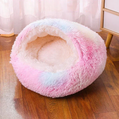 Plush winter round dog bed for small and medium pets, providing warmth and comfort for a cozy resting spot.