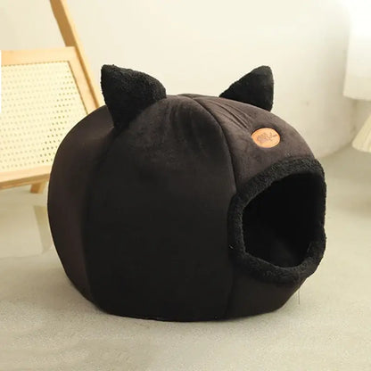 Deep sleep comfort cat bed in cave design, made with soft plush material and non-slip base for warm, cozy winter sleep.