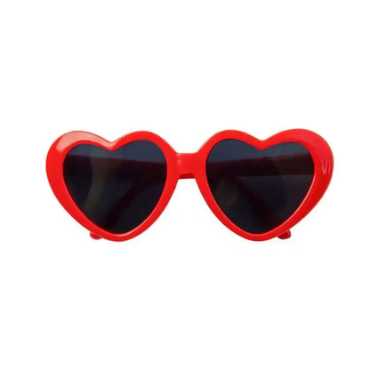 Dog wearing cute heart-shaped sunglasses for outdoor photoshoot or event